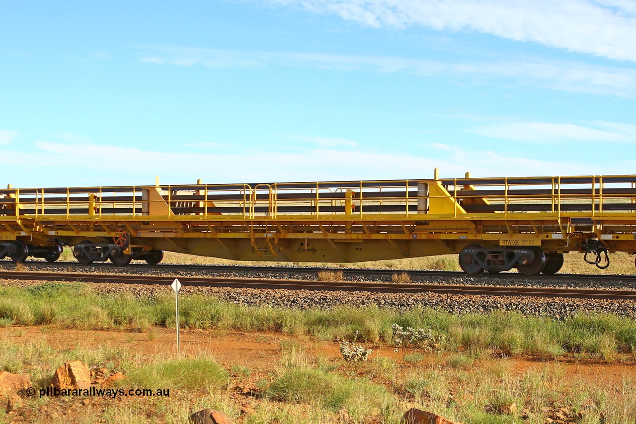 210510 1115
Near Gull on the Rio Tinto Dampier - Tom Price line at the 101.5 km, RTW type intermediate rail waggon RTB 005 on Rio Tinto's Gemco Rail built rail train consist. 10th May 2021. [url=https://goo.gl/maps/9WbRn1E4vP6a1YbN8]Location[/url].
Keywords: RTW-type;RTW005;Gemco-Rail-WA;