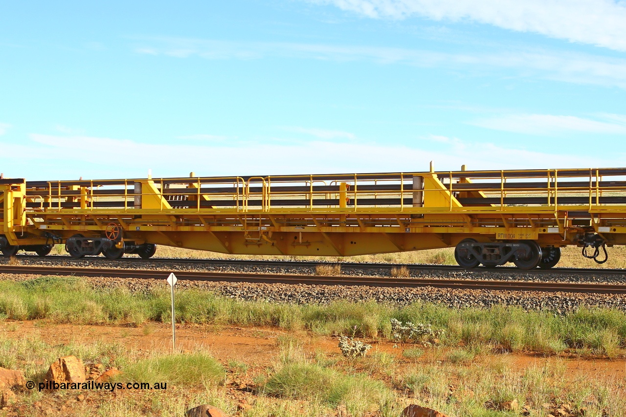 210510 1116
Near Gull on the Rio Tinto Dampier - Tom Price line at the 101.5 km, RTW type intermediate rail waggon RTB 004 on Rio Tinto's Gemco Rail built rail train consist. 10th May 2021. [url=https://goo.gl/maps/9WbRn1E4vP6a1YbN8]Location[/url].
Keywords: RTW-type;RTW004;Gemco-Rail-WA;