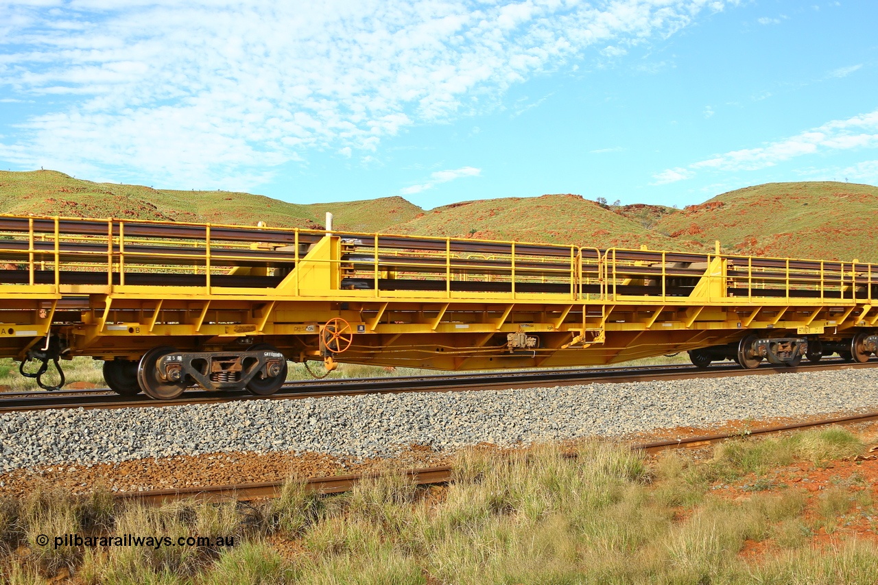 210510 1135
Near Galah on the Rio Tinto Dampier - Tom Price line at the 89.5 km, RTW type intermediate rail waggon RTB 018 on Rio Tinto's Gemco Rail built rail train consist. 10th May 2021. [url=https://goo.gl/maps/tSmgEtp7gcG7x24b9]Location[/url].
Keywords: RTW-type;RTW018;Gemco-Rail-WA;