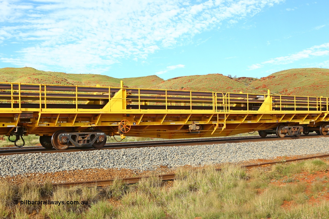 210510 1142
Near Galah on the Rio Tinto Dampier - Tom Price line at the 89.5 km, RTW type intermediate rail waggon RTB 011 on Rio Tinto's Gemco Rail built rail train consist. 10th May 2021. [url=https://goo.gl/maps/tSmgEtp7gcG7x24b9]Location[/url].
Keywords: RTW-type;RTW011;Gemco-Rail-WA;