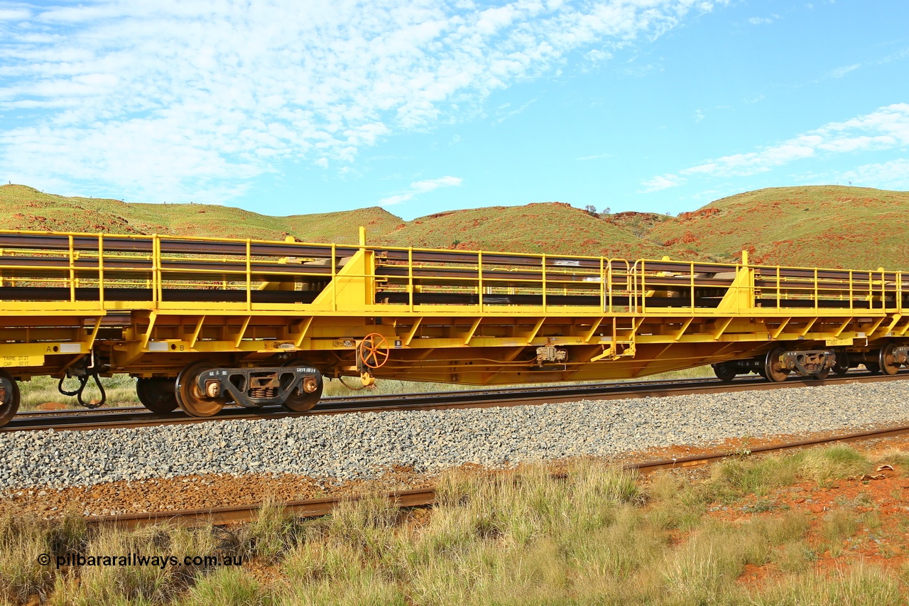 210510 1146
Near Galah on the Rio Tinto Dampier - Tom Price line at the 89.5 km, RTW type intermediate rail waggon RTB 007 on Rio Tinto's Gemco Rail built rail train consist. 10th May 2021. [url=https://goo.gl/maps/tSmgEtp7gcG7x24b9]Location[/url].
Keywords: RTW-type;RTW007;Gemco-Rail-WA;