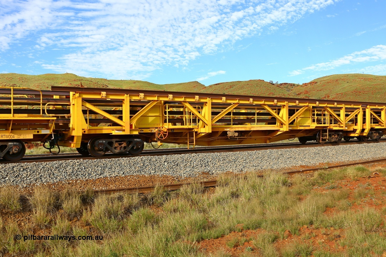 210510 1150
Near Galah on the Rio Tinto Dampier - Tom Price line at the 89.5 km, RTS type straddle crane carrying rail waggon RTS 003 on Rio Tinto's Gemco Rail built rail train consist. 10th May 2021. [url=https://goo.gl/maps/tSmgEtp7gcG7x24b9]Location[/url].
Keywords: RTS-type;RTS003;Gemco-Rail-WA;