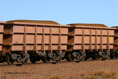 3113-7167 050828 5085
Tunkawanna, loaded Hamersley Iron Bradken built S series waggon pair 3113 control and 7167 slave built in December 2003. August 28, 2005.
Keywords: 3113;7167;S-series;Bradken-Rail-Qld;Rio-ore-waggon;