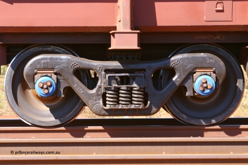7571 050828 5309
Lyre Siding, empty Hamersley Iron Bradken built S series waggon bogie under slave waggon 7571 with a cast date of February 2005. Brenco 'K' class  bearings AAR28 and 6 1/2 x 9 sizing. August 28, 2005.
Keywords: 7571;S-type;Bradken-Rail-Qld;Rio-ore-waggon;