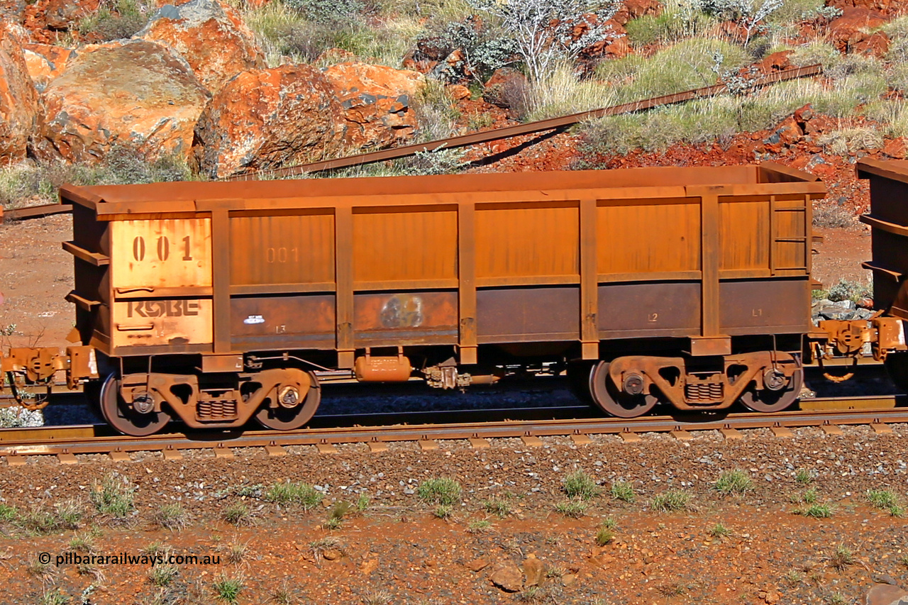 0001 180616 1707
Robe River ore waggon 001, built by Nippon Sharyo Nihon, rotary coupler end non-handbrake side empty view at the 38 km, Harding on the Cape Lambert line, June 16, 2018.
Keywords: 001;Nippon-Sharyo-Nihon;Robe-ore-waggon;