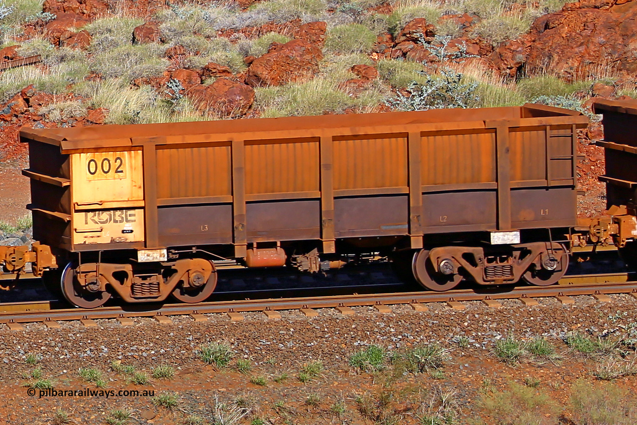 0002 180616 1713
Robe River ore waggon 002, built by Nippon Sharyo Nihon, rotary coupler end non-handbrake side empty view at the 38 km, Harding on the Cape Lambert line, June 16, 2018.
Keywords: 002;Nippon-Sharyo-Nihon;Robe-ore-waggon;