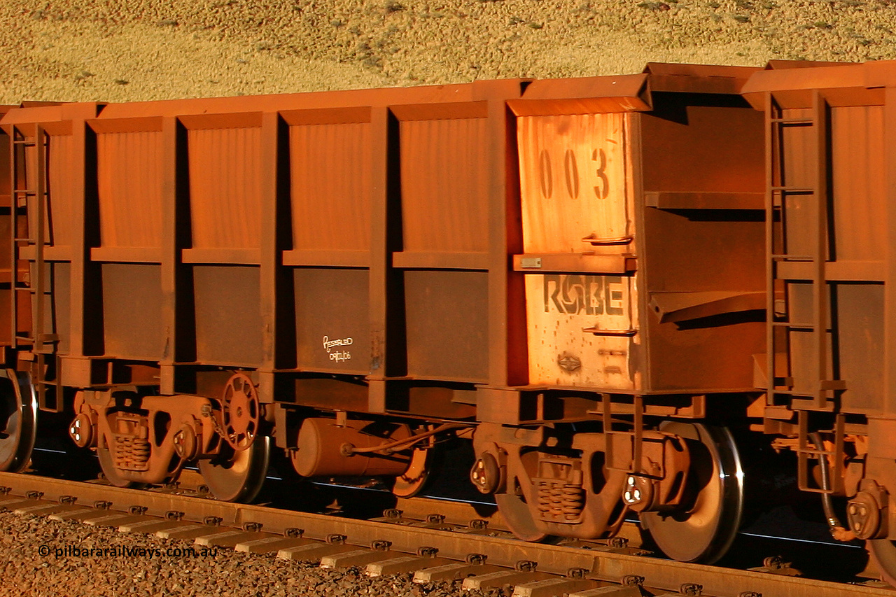 0003 060722 7618
Robe River ore waggon 003, built by Nippon Sharyo Nihon, rotary coupler end handbrake side empty view at the 11.7 km, Cape Lambert. July 22, 2006.
Keywords: 003;Nippon-Sharyo-Nihon;Robe-ore-waggon;
