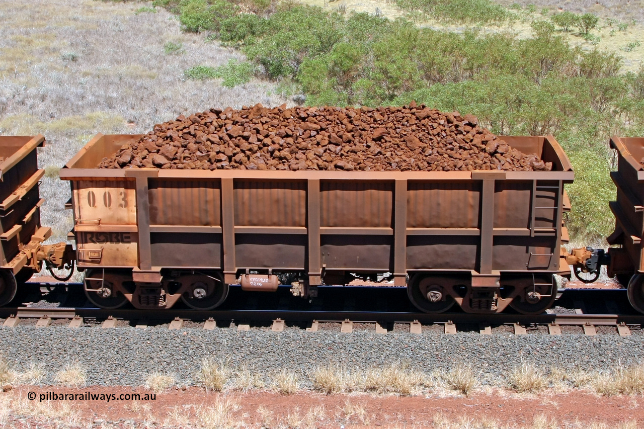 0003 081209 0110
Robe River ore waggon 003, built by Nippon Sharyo Nihon, non-handbrake side loaded view at the 7 km location just south of Cape Lambert yard. December 9, 2008.
Keywords: 003;Nippon-Sharyo-Nihon;Robe-ore-waggon;