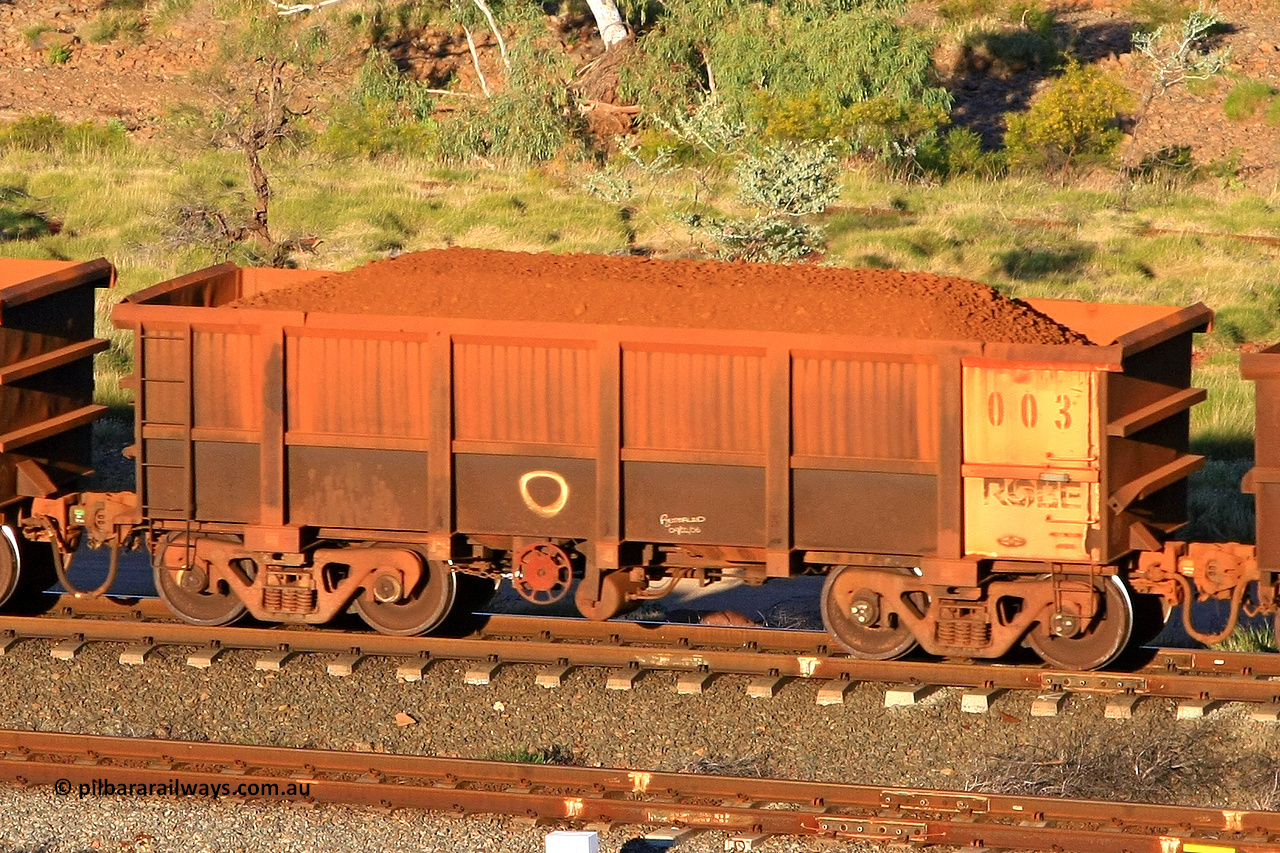 0003 110602 1629
Robe River ore waggon 003, built by Nippon Sharyo Nihon, rotary coupler end handbrake side loaded view at the 71 km, Western Creek on the Deepdale line. June 2, 2011.
Keywords: 003;Nippon-Sharyo-Nihon;Robe-ore-waggon;