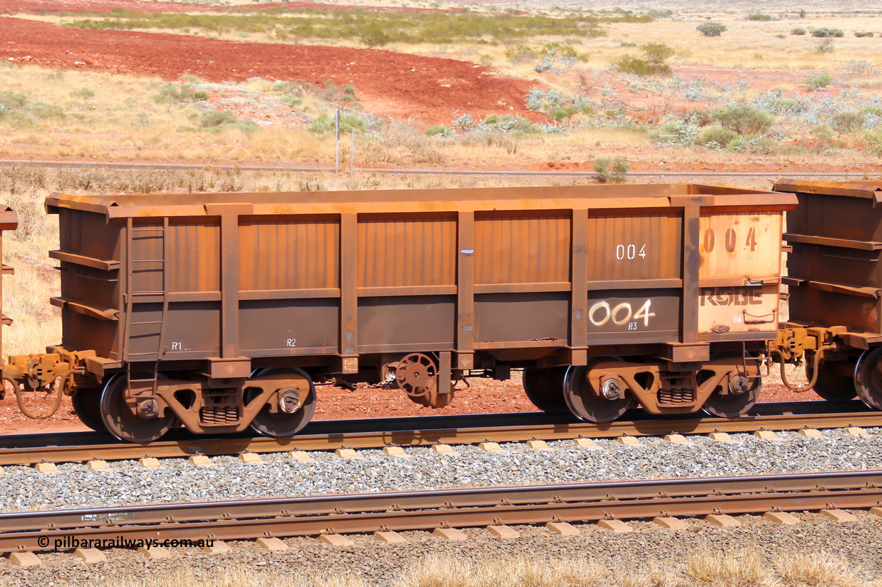 0004 141124 6850
Robe River ore waggon 004, built by Nippon Sharyo Nihon, fixed coupler handbrake side empty view at the 25 km at Arches Siding on the Cape Lambert line. November 24, 2014.
Keywords: 004;Nippon-Sharyo-Nihon;Robe-ore-waggon;