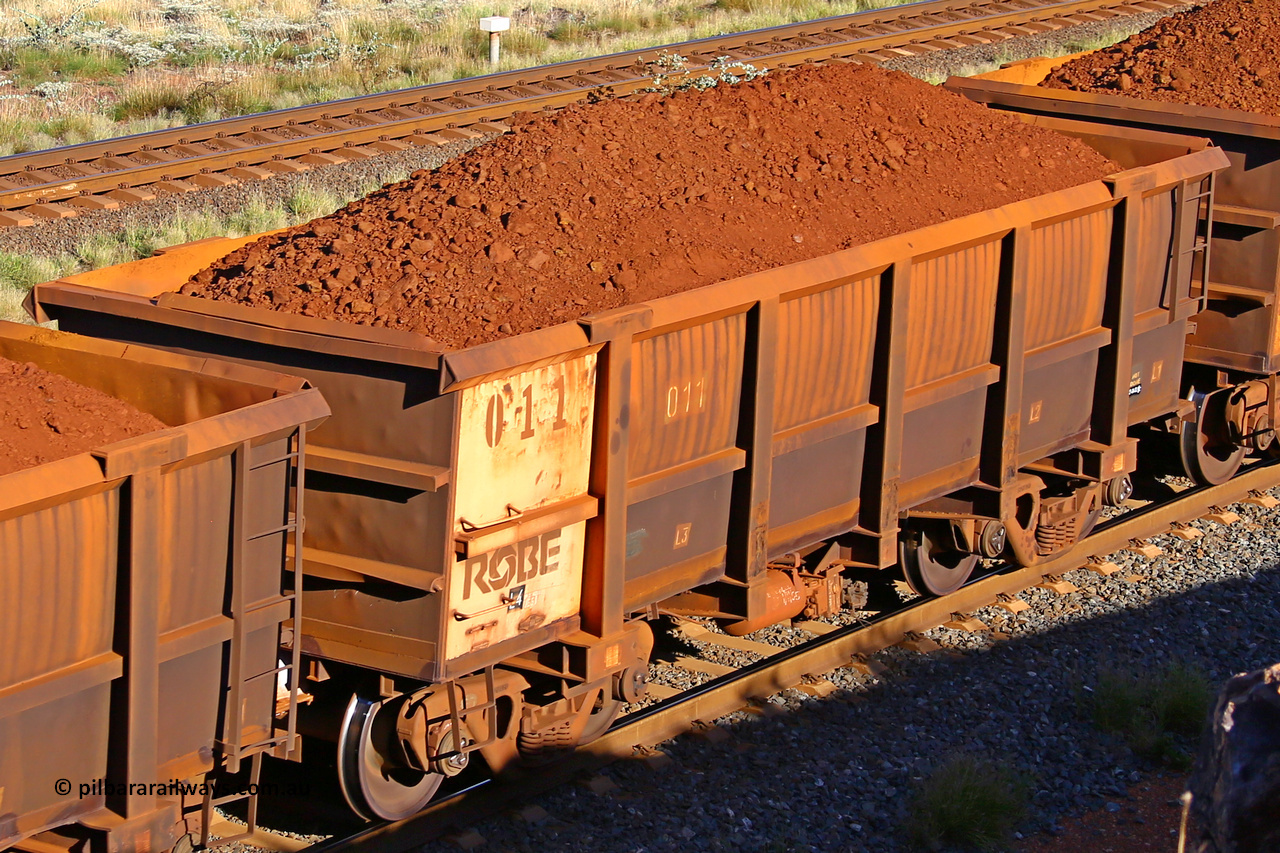 0011 210322 9782
Robe River ore waggon 011, built by Nippon Sharyo Nihon, rotary coupler end non-handbrake side loaded view at the 17 km on the Cape Lambert line, March 22, 2021.
Keywords: 011;Nippon-Sharyo-Nihon;Robe-ore-waggon;