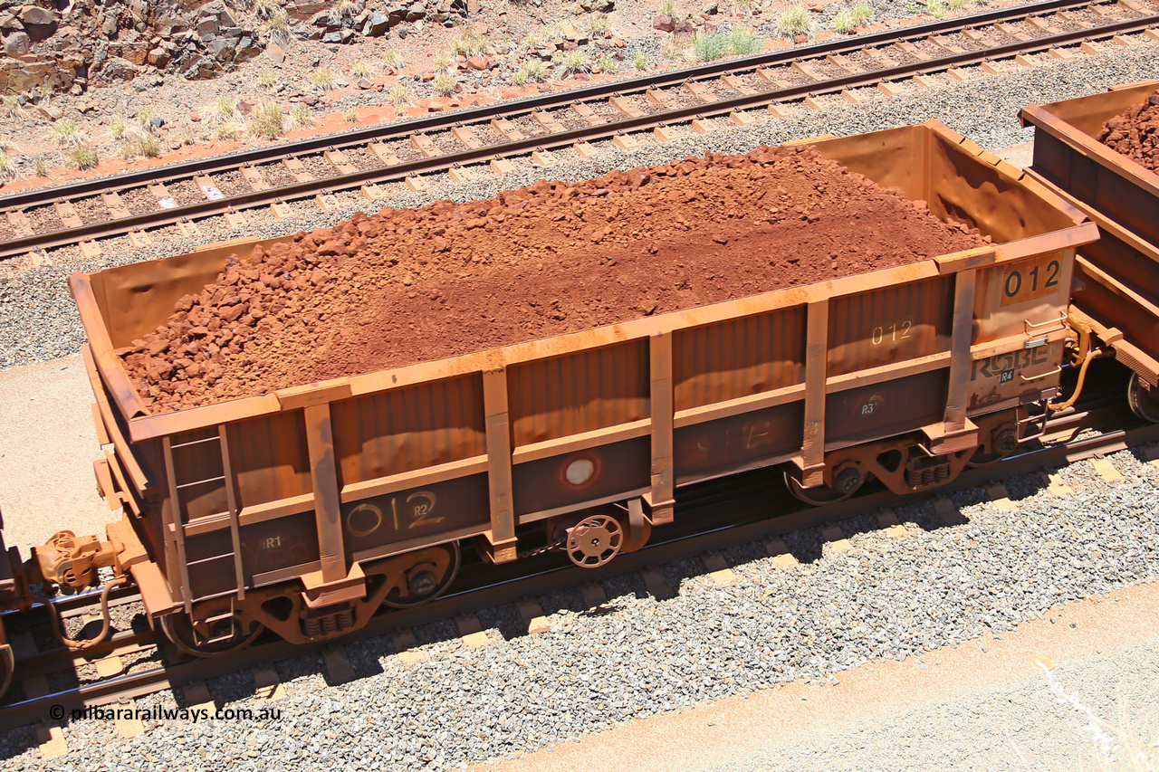 0012 160306 1473
Robe River ore waggon 012, built by Nippon Sharyo Nihon, fixed coupler handbrake side loaded view at the 45 km, Harding Siding on the Cape Lambert line. March 6, 2016.
Keywords: 012;Nippon-Sharyo-Nihon;Robe-ore-waggon;