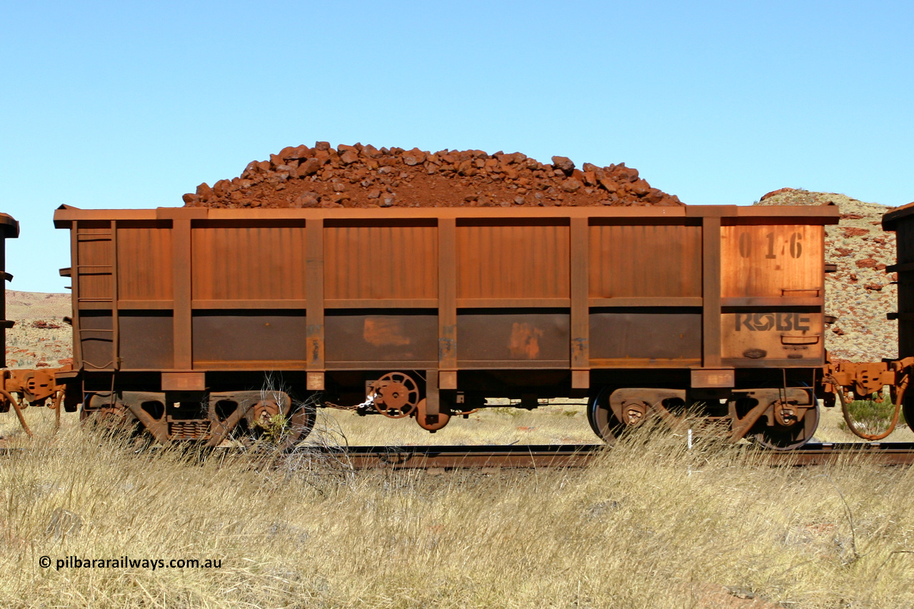 0016 060722 7511
Robe River ore waggon 016, built by Nippon Sharyo Nihon, handbrake side loaded view at the 78.8 km between Western Creek and Maitland on the Deepdale line. July 22, 2007.
Keywords: 016;Nippon-Sharyo-Nihon;Robe-ore-waggon;