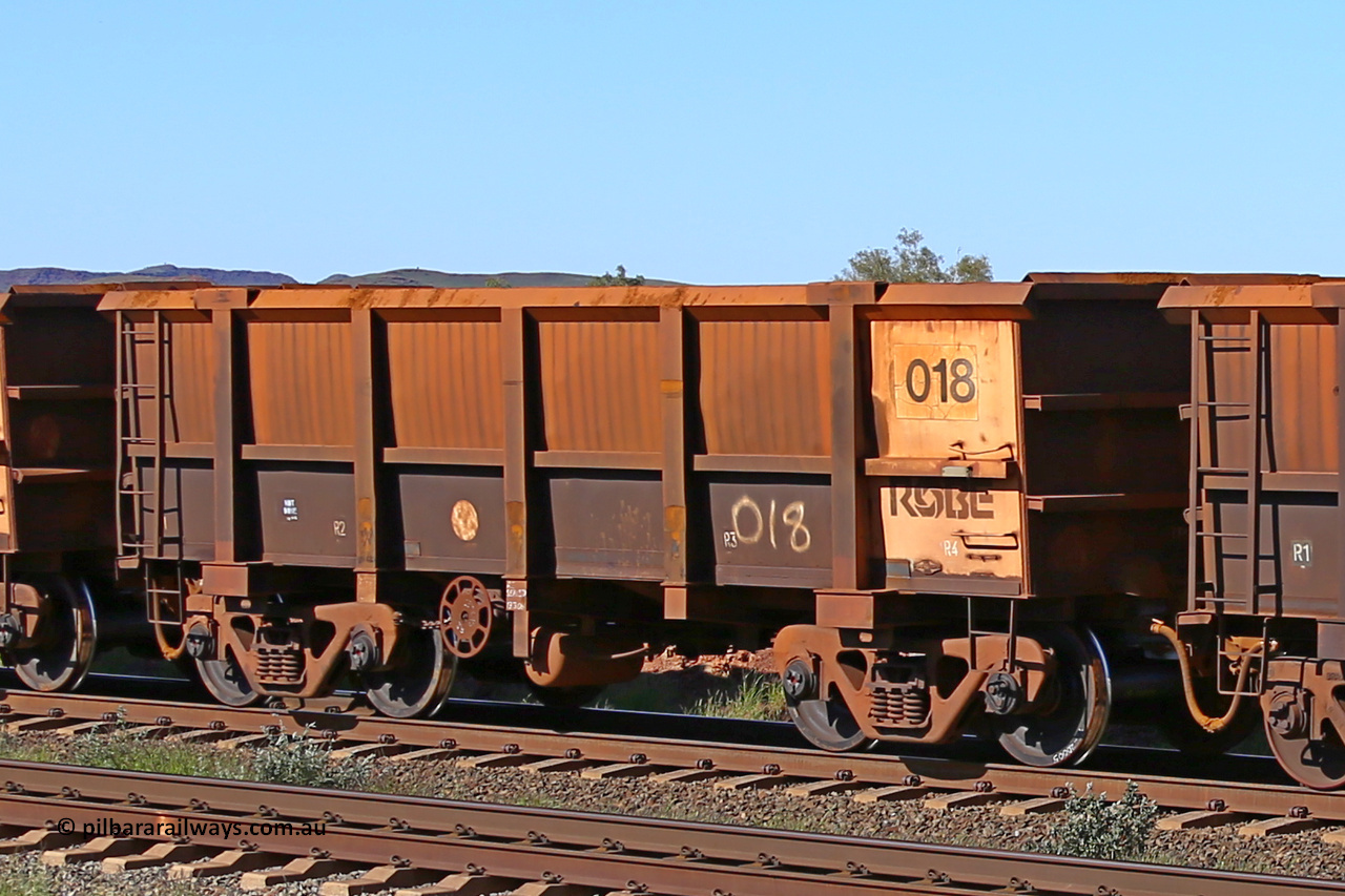 0018 160727 0984
Robe River ore waggon 018, built by Nippon Sharyo Nihon, rotary coupler end handbrake side empty view at Harding Siding on the Cape Lambert line, July 27, 2016.
Keywords: 018;Nippon-Sharyo-Nihon;Robe-ore-waggon;