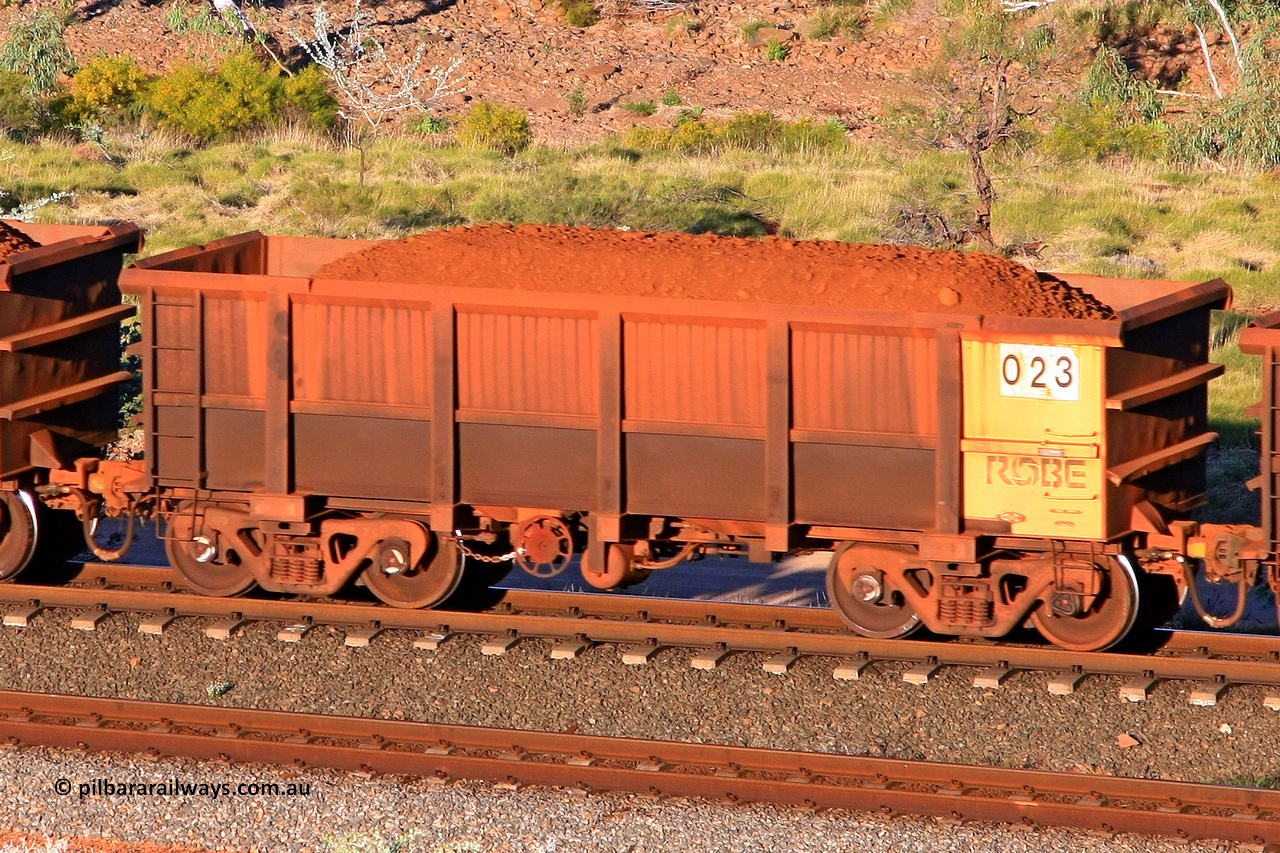 0023 110602 1718
Robe River ore waggon 023, built by Nippon Sharyo Nihon, rotary coupler end handbrake side loaded view at the 71 km, Western Creek on the Deepdale line. June 2, 2011.
Keywords: 023;Nippon-Sharyo-Nihon;Robe-ore-waggon;