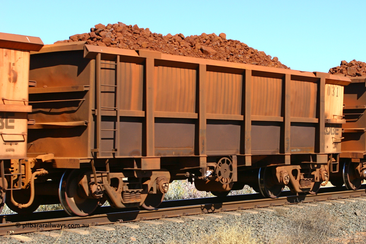 0031 060716 7190
Robe River ore waggon 938, built by Centurion Industries WA, fixed coupler end handbrake side loaded. Western Creek, July 16, 2006.
Keywords: 031;Nippon-Sharyo-Nihon;Robe-ore-waggon;