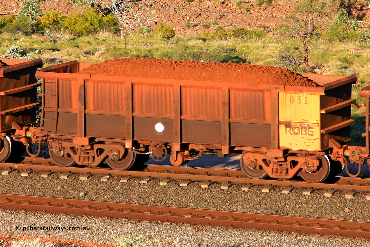 0031 110602 1721
Robe River ore waggon 031, built by Nippon Sharyo Nihon, rotary coupler end handbrake side loaded view at the 71 km, Western Creek on the Deepdale line. June 2, 2011.
Keywords: 031;Nippon-Sharyo-Nihon;Robe-ore-waggon;