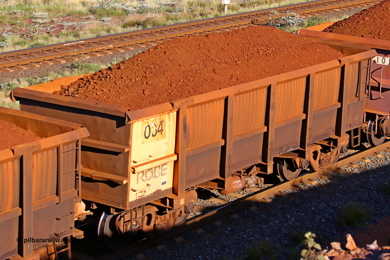 0034 210322 9744
Robe River ore waggon 034, built by Nippon Sharyo Nihon, rotary coupler end non-handbrake side loaded view at the 17 km on the Cape Lambert line, March 22, 2021.
Keywords: 034;Nippon-Sharyo-Nihon;Robe-ore-waggon;