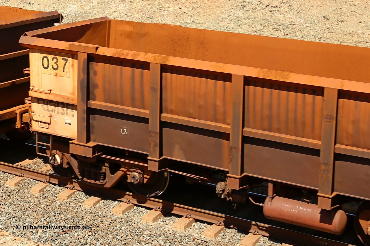 0037 160306 1276
Robe River ore waggon 037, built by Centurion Industries WA, rotary coupler non-handbrake side empty view with Centurion Industries waybill holder and no visible plate markings, suspected replacement built body, at Greenpool on the Cape Lambert line. March 6, 2016.
Keywords: 037;Centurion-Industries-WA;Robe-ore-waggon;