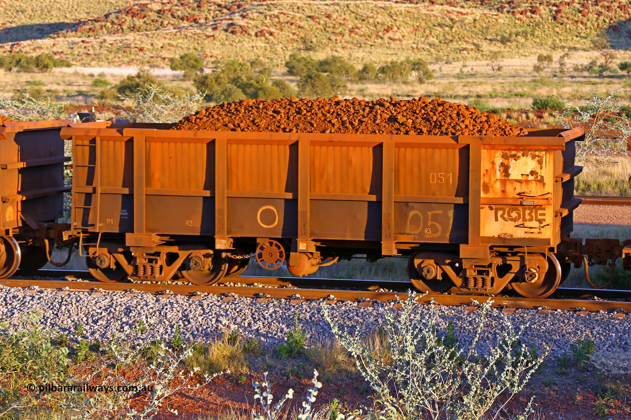 0051 170513 8689
Robe River ore waggon 051, built by Nippon Sharyo Nihon, handbrake side loaded view, Cape Lambert yard, May 13, 2017.
Keywords: 051;Nippon-Sharyo-Nihon;Robe-ore-waggon;