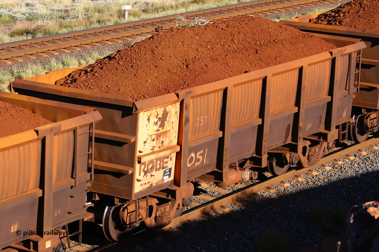 0051 210322 9785
Robe River ore waggon 051, built by Nippon Sharyo Nihon, rotary coupler end non-handbrake side loaded view at the 17 km on the Cape Lambert line, March 22, 2021.
Keywords: 051;Nippon-Sharyo-Nihon;Robe-ore-waggon;