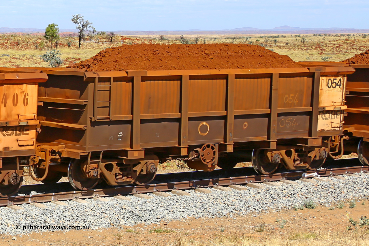 0054 170729 0253
Robe River ore waggon 054, built by Nippon Sharyo Nihon, fixed coupler handbrake side loaded view at the 103 km, between Maitland Siding and the Fortescue River on the Deepdale line. July 29, 2017.
Keywords: 054;Nippon-Sharyo-Nihon;Robe-ore-waggon;