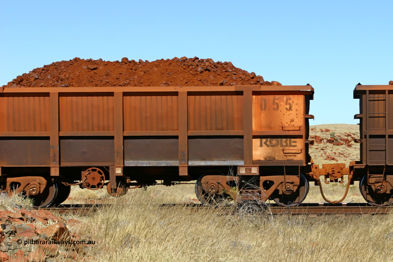0055 060722 7488
Robe River ore waggon 055, built by Nippon Sharyo Nihon, handbrake side loaded view at the 78.8 km between Western Creek and Maitland on the Deepdale line. July 22, 2006.
Keywords: 055;Nippon-Sharyo-Nihon;Robe-ore-waggon;