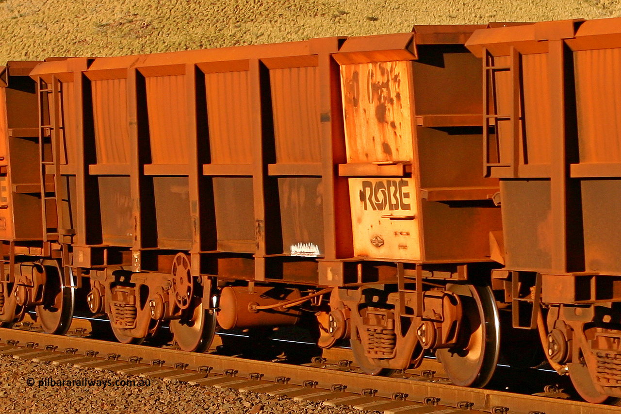 0063 060722 7586
Robe River ore waggon 063, built by Nippon Sharyo Nihon, rotary coupler end handbrake side empty view at the 11.7 km, Cape Lambert. July 22, 2006.
Keywords: 063;Nippon-Sharyo-Nihon;Robe-ore-waggon;
