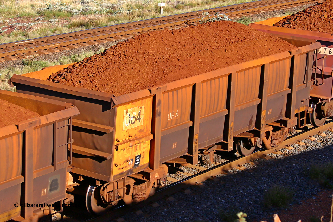 0064 210322 9788
Robe River ore waggon 064, built by Nippon Sharyo Nihon, rotary coupler end non-handbrake side loaded view at the 17 km on the Cape Lambert line, March 22, 2021.
Keywords: 064;Nippon-Sharyo-Nihon;Robe-ore-waggon;