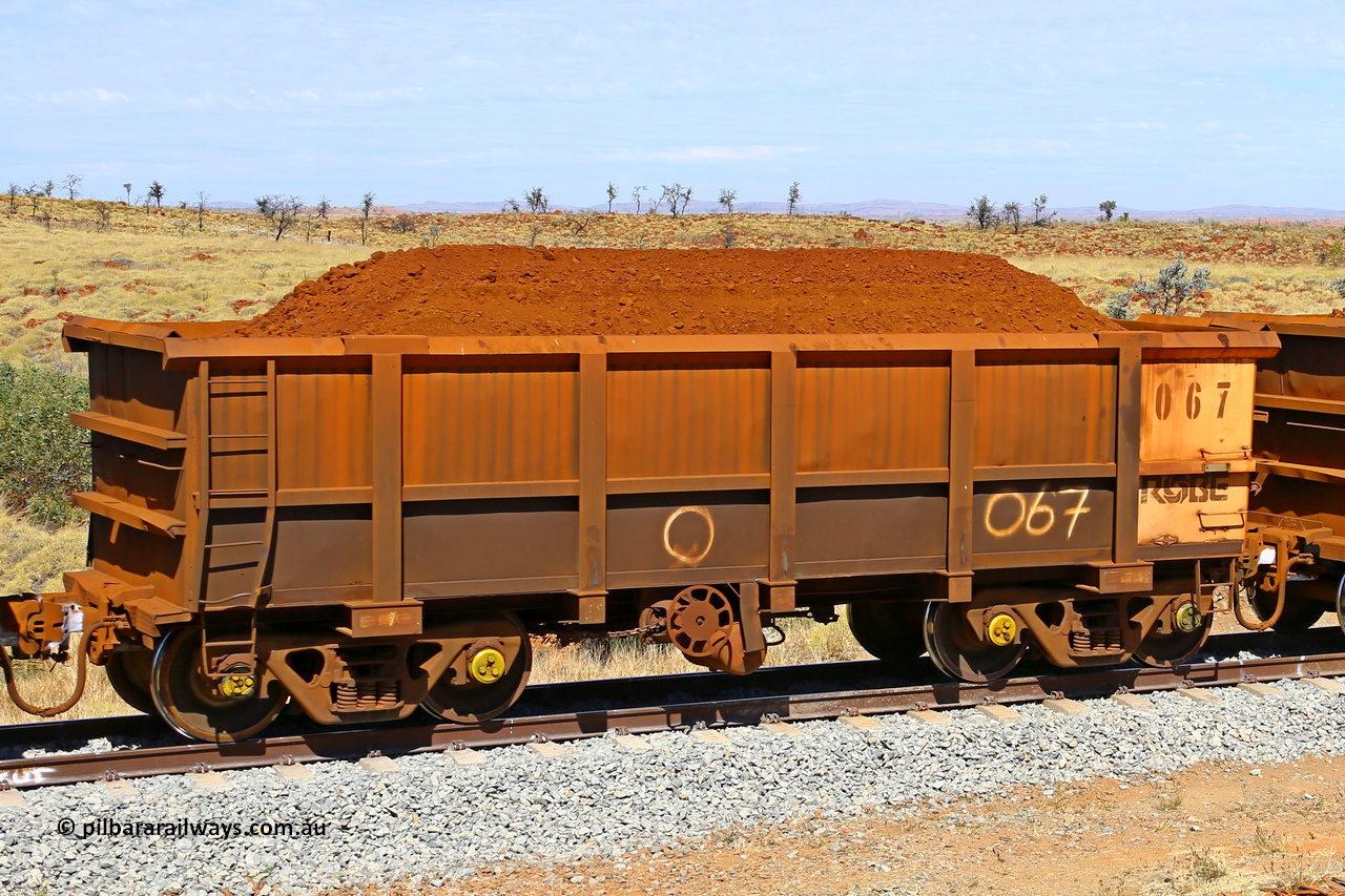0067 170729 0239
Robe River ore waggon 067, built by Nippon Sharyo Nihon, fixed coupler handbrake side loaded view at the 103 km, between Maitland Siding and the Fortescue River on the Deepdale line. July 29, 2017.
Keywords: 067;Nippon-Sharyo-Nihon;Robe-ore-waggon;