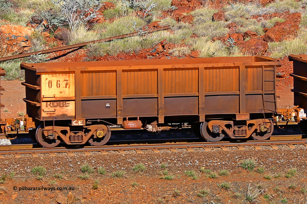0067 180616 1700
Robe River ore waggon 067, built by Nippon Sharyo Nihon, rotary coupler end non-handbrake side empty view at the 38 km, Harding on the Cape Lambert line, June 16, 2018.
Keywords: 067;Nippon-Sharyo-Nihon;Robe-ore-waggon;