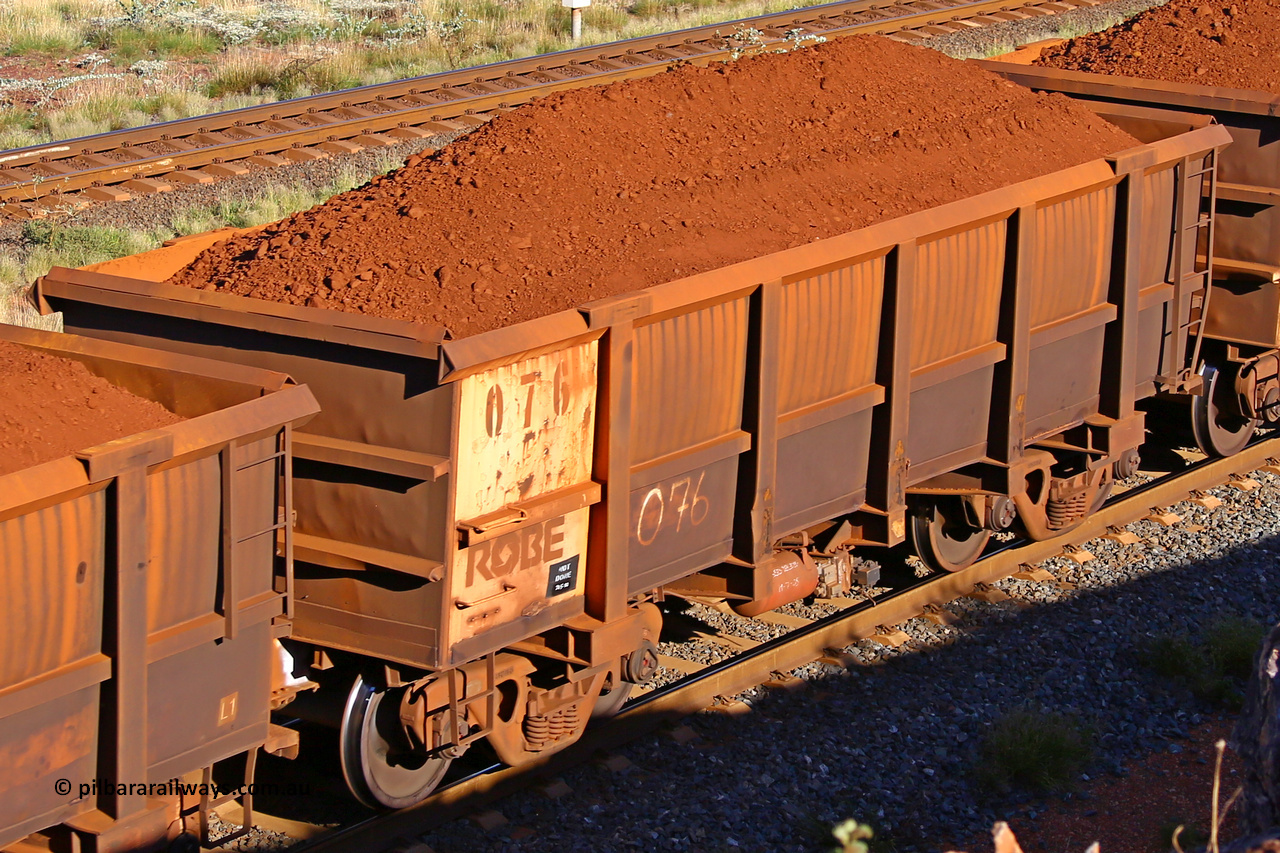 0076 210322 9703
Robe River ore waggon 076, built by Nippon Sharyo Nihon, rotary coupler end non-handbrake side loaded view at the 17 km on the Cape Lambert line, March 22, 2021.
Keywords: 076;Nippon-Sharyo-Nihon;Robe-ore-waggon;
