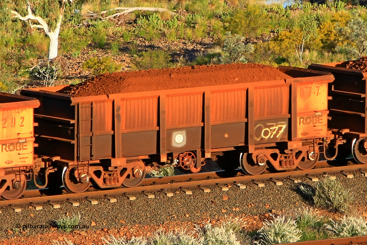0077 110602 1595
Robe River ore waggon 077, built by Nippon Sharyo Nihon, fixed coupler handbrake side loaded view at the 71 km, Western Creek on the Deepdale line. June 2, 2011.
Keywords: 077;Nippon-Sharyo-Nihon;Robe-ore-waggon;