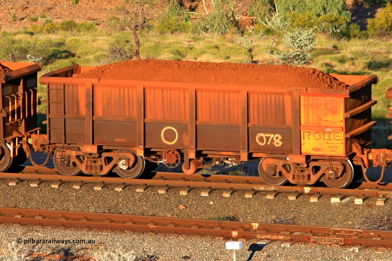 0078 110602 1631
Robe River ore waggon 078, built by Nippon Sharyo Nihon, rotary coupler end handbrake side loaded view at the 71 km, Western Creek on the Deepdale line. June 2, 2011.
Keywords: 078;Nippon-Sharyo-Nihon;Robe-ore-waggon;