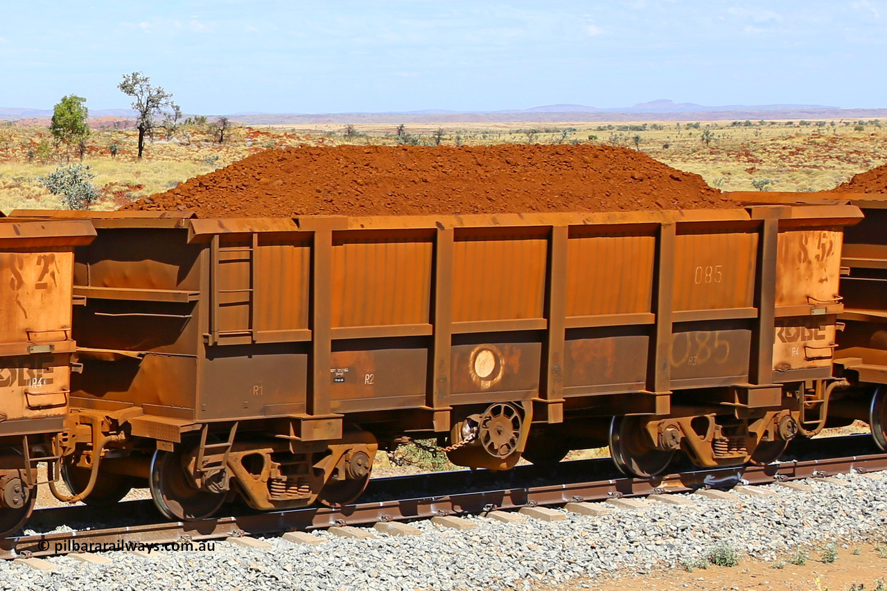 0085 170729 0216
Robe River ore waggon 085, built by Nippon Sharyo Nihon, fixed coupler handbrake side loaded view at the 103 km, between Maitland Siding and the Fortescue River on the Deepdale line. July 29, 2017.
Keywords: 085;Nippon-Sharyo-Nihon;Robe-ore-waggon;