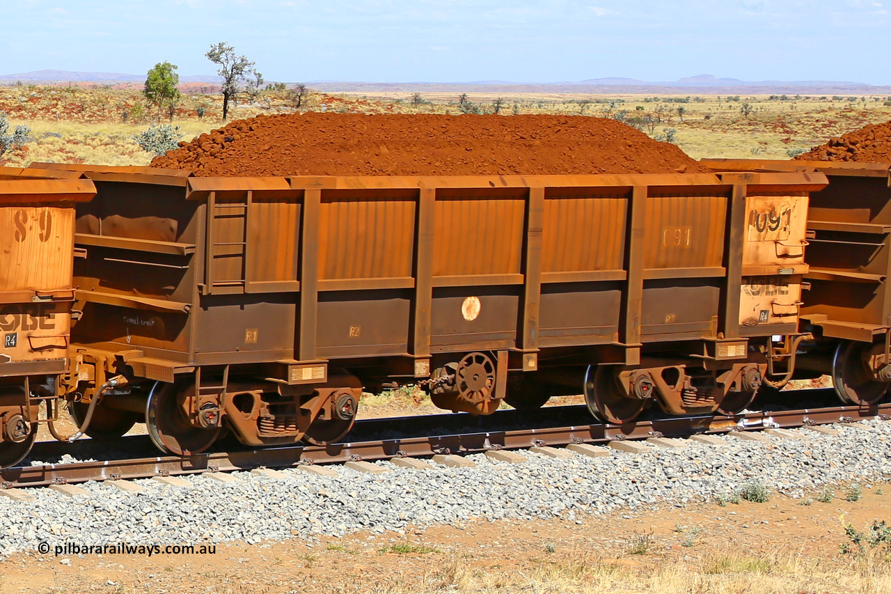 0091 170729 0237
Robe River ore waggon 091, built by Nippon Sharyo Nihon, fixed coupler handbrake side loaded view at the 103 km, between Maitland Siding and the Fortescue River on the Deepdale line. July 29, 2017.
Keywords: 091;Nippon-Sharyo-Nihon;Robe-ore-waggon;