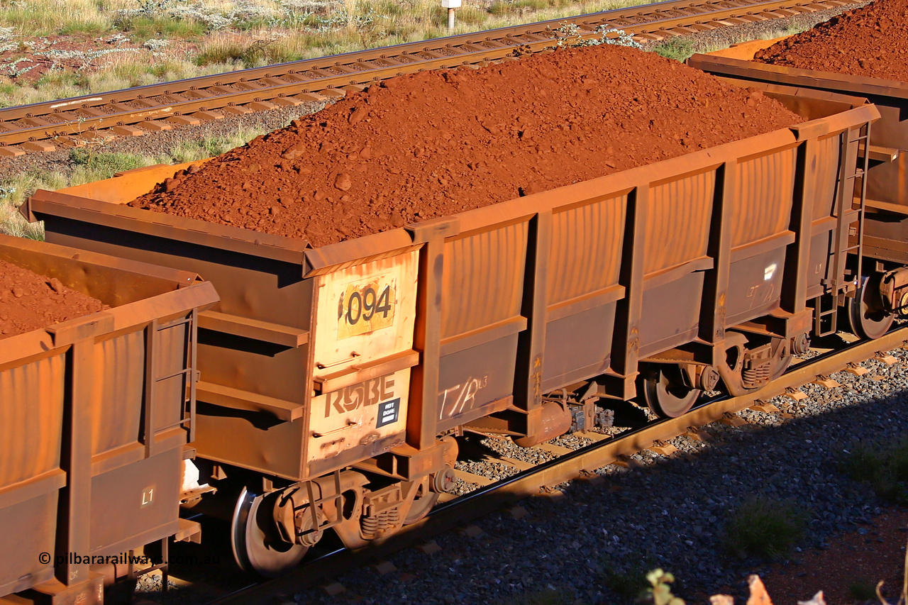 0094 210322 9749
Robe River ore waggon 094, built by Nippon Sharyo Nihon, rotary coupler end non-handbrake side loaded view at the 17 km on the Cape Lambert line, March 22, 2021.
Keywords: 094;Nippon-Sharyo-Nihon;Robe-ore-waggon;