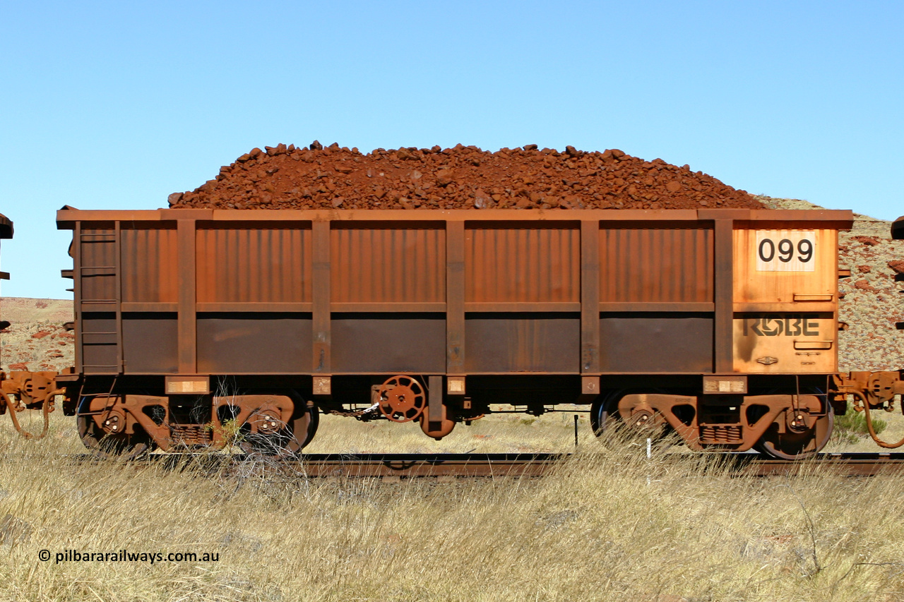 0099 060722 7521
Robe River ore waggon 099, built by Nippon Sharyo Nihon, handbrake side loaded view at the 78.8 km between Western Creek and Maitland on the Deepdale line. July 22, 2006.
Keywords: 097;Nippon-Sharyo-Nihon;Robe-ore-waggon;