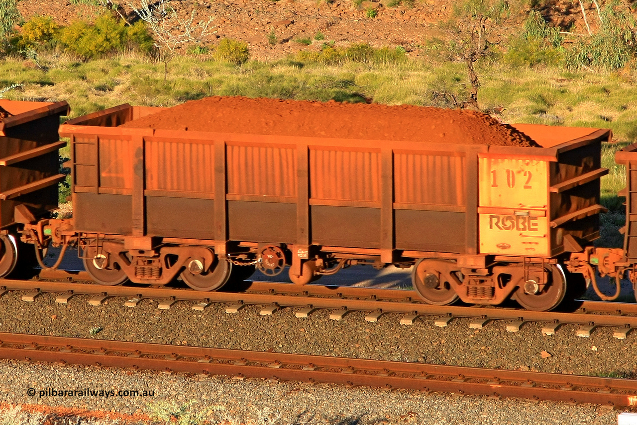 0102 110602 1689
Robe River ore waggon 102, built by Nippon Sharyo Nihon, rotary coupler end handbrake side loaded view at the 71 km, Western Creek on the Deepdale line. June 2, 2011.
Keywords: 102;Nippon-Sharyo-Nihon;Robe-ore-waggon;