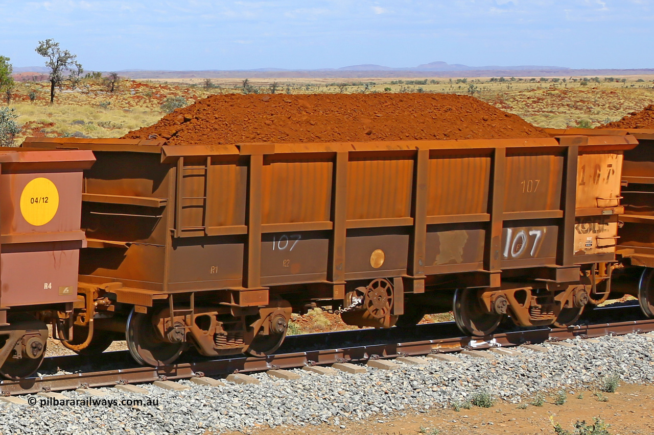 0107 170729 0222
Robe River ore waggon 107, built by Nippon Sharyo Nihon, fixed coupler handbrake side loaded view at the 103 km, between Maitland Siding and the Fortescue River on the Deepdale line. July 29, 2017.
Keywords: 107;Nippon-Sharyo-Nihon;Robe-ore-waggon;