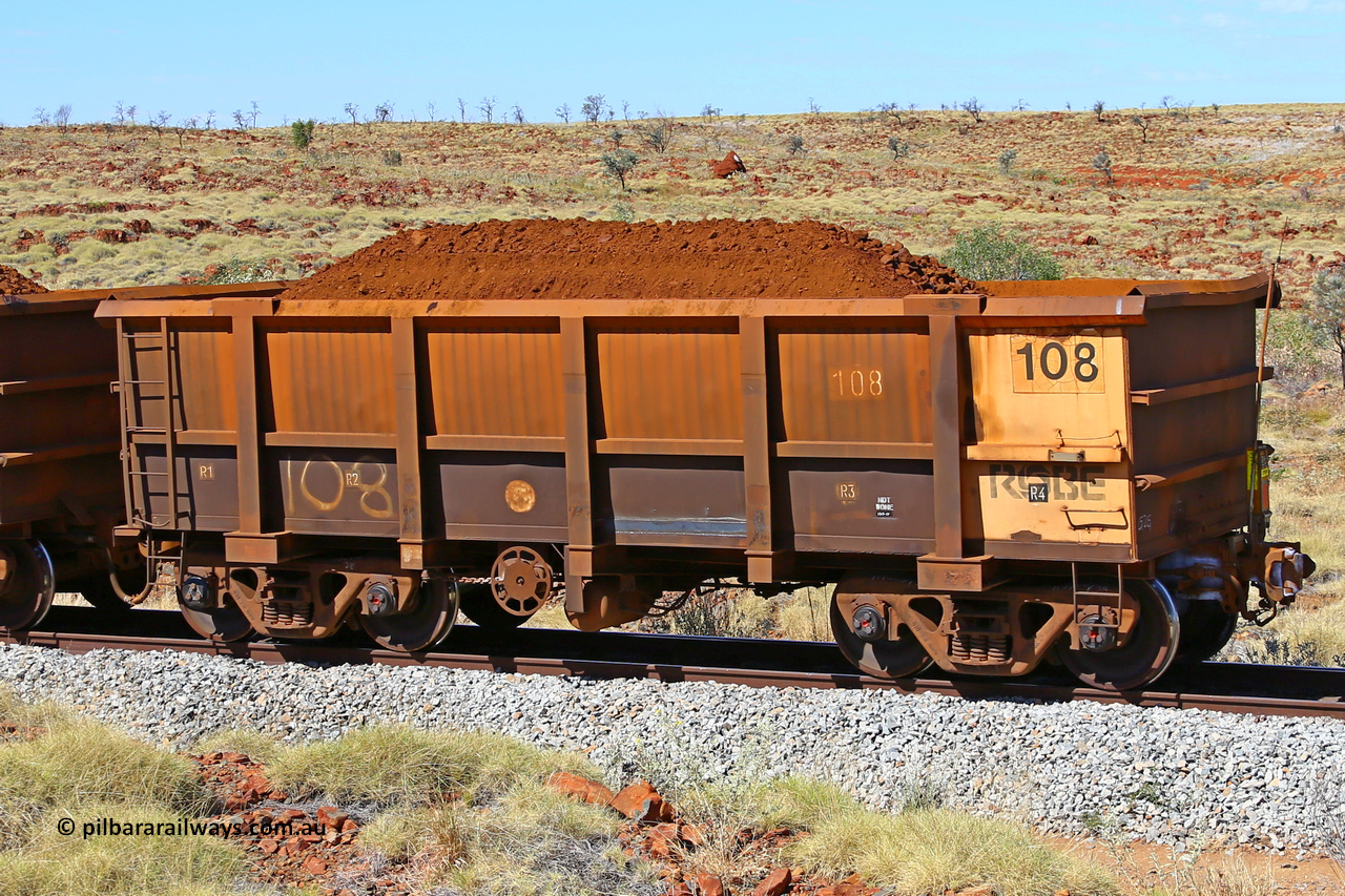 0108 170729 0279
Robe River ore waggon 108, built by Nippon Sharyo Nihon, rotary coupler end handbrake side loaded view, end of train, at the 103 km, between Maitland Siding and the Fortescue River on the Deepdale line. July 29, 2017.
Keywords: 108;Nippon-Sharyo-Nihon;Robe-ore-waggon;