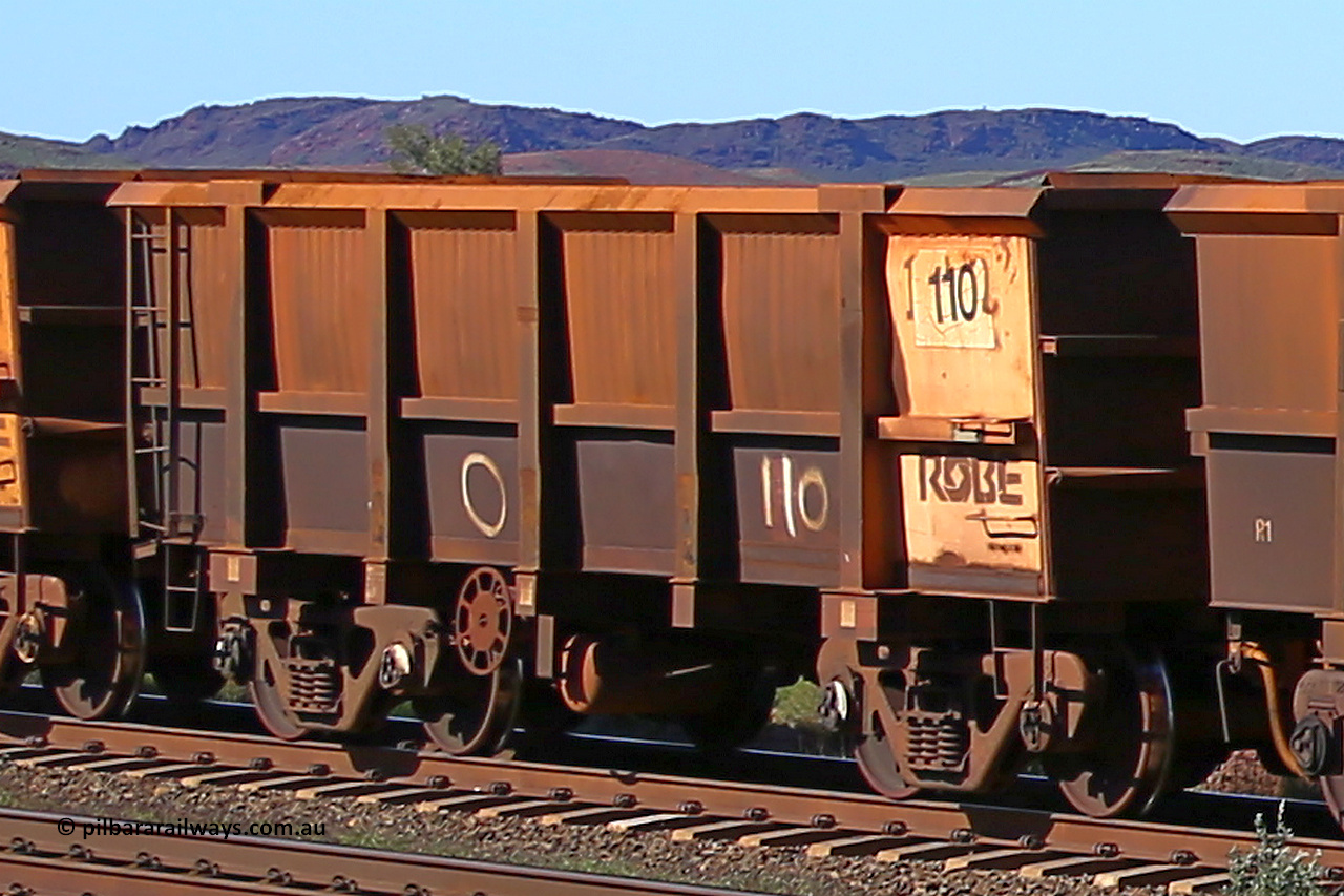 0110 160727 0950
Robe River ore waggon 110, built by Nippon Sharyo Nihon, rotary coupler end handbrake side empty view at Harding Siding on the Cape Lambert line, July 27, 2016.
Keywords: 110;Nippon-Sharyo-Nihon;Robe-ore-waggon;