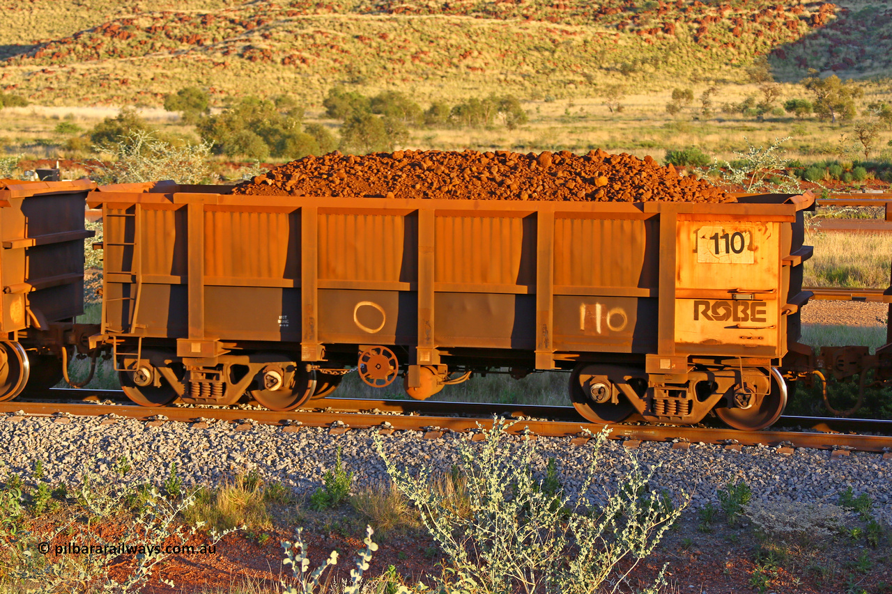 0110 170513 8686
Robe River ore waggon 110, built by Nippon Sharyo Nihon, rotary coupler end handbrake side loaded view, Cape Lambert yard, May 13, 2017.
Keywords: 110;Nippon-Sharyo-Nihon;Robe-ore-waggon;