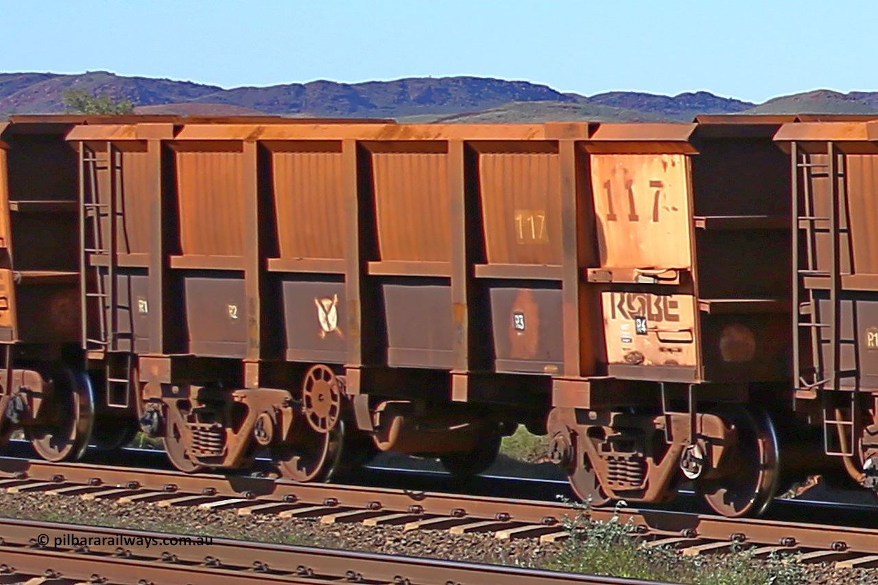 0117 160727 0969
Robe River ore waggon 117, built by Nippon Sharyo Nihon, rotary coupler end handbrake side empty view at Harding Siding on the Cape Lambert line, July 27, 2016.
Keywords: 117;Nippon-Sharyo-Nihon;Robe-ore-waggon;