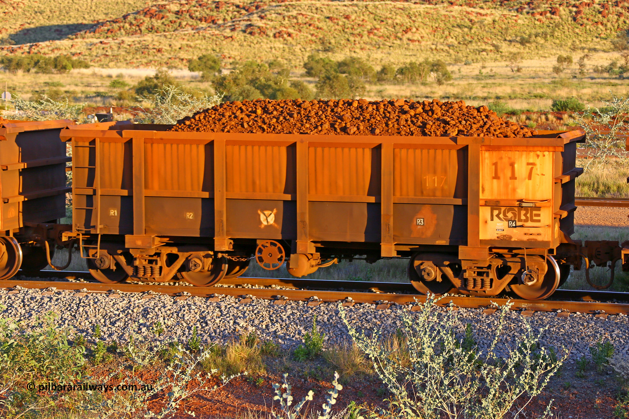 0117 170513 8688
Robe River ore waggon 117, built by Nippon Sharyo Nihon, handbrake side loaded view, Cape Lambert yard, May 13, 2017.
Keywords: 117;Nippon-Sharyo-Nihon;Robe-ore-waggon;