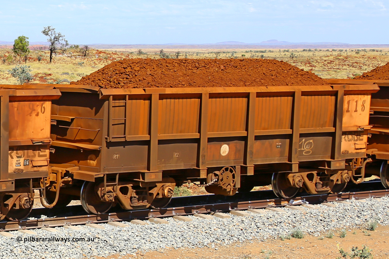0118 170729 0207
Robe River ore waggon 118, built by Nippon Sharyo Nihon, fixed coupler handbrake side loaded view at the 103 km, between Maitland Siding and the Fortescue River on the Deepdale line. July 29, 2017.
Keywords: 118;Nippon-Sharyo-Nihon;Robe-ore-waggon;