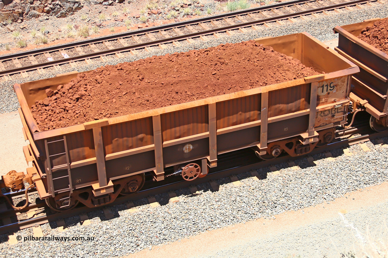 0119 160306 1457
Robe River ore waggon 119, built by Nippon Sharyo Nihon, fixed coupler handbrake side loaded view at the 45 km, Harding Siding on the Cape Lambert line. March 6, 2016.
Keywords: 119;Nippon-Sharyo-Nihon;Robe-ore-waggon;