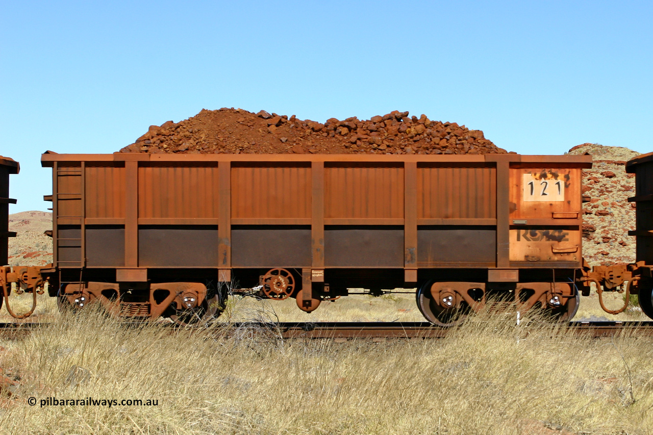 0121 060722 7496
Robe River ore waggon 121, built by Nippon Sharyo Nihon, handbrake side loaded view at the 78.8 km between Western Creek and Maitland on the Deepdale line. July 22, 2006.
Keywords: 121;Nippon-Sharyo-Nihon;Robe-ore-waggon;