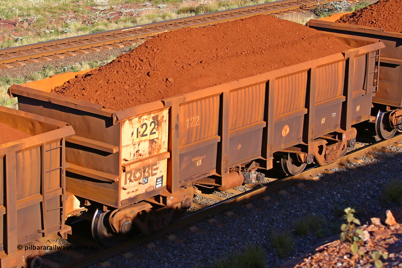 0122 210322 9689
Robe River ore waggon 122, built by Nippon Sharyo Nihon, rotary coupler end non-handbrake side loaded view at the 17 km on the Cape Lambert line, March 22, 2021.
Keywords: 122;Nippon-Sharyo-Nihon;Robe-ore-waggon;