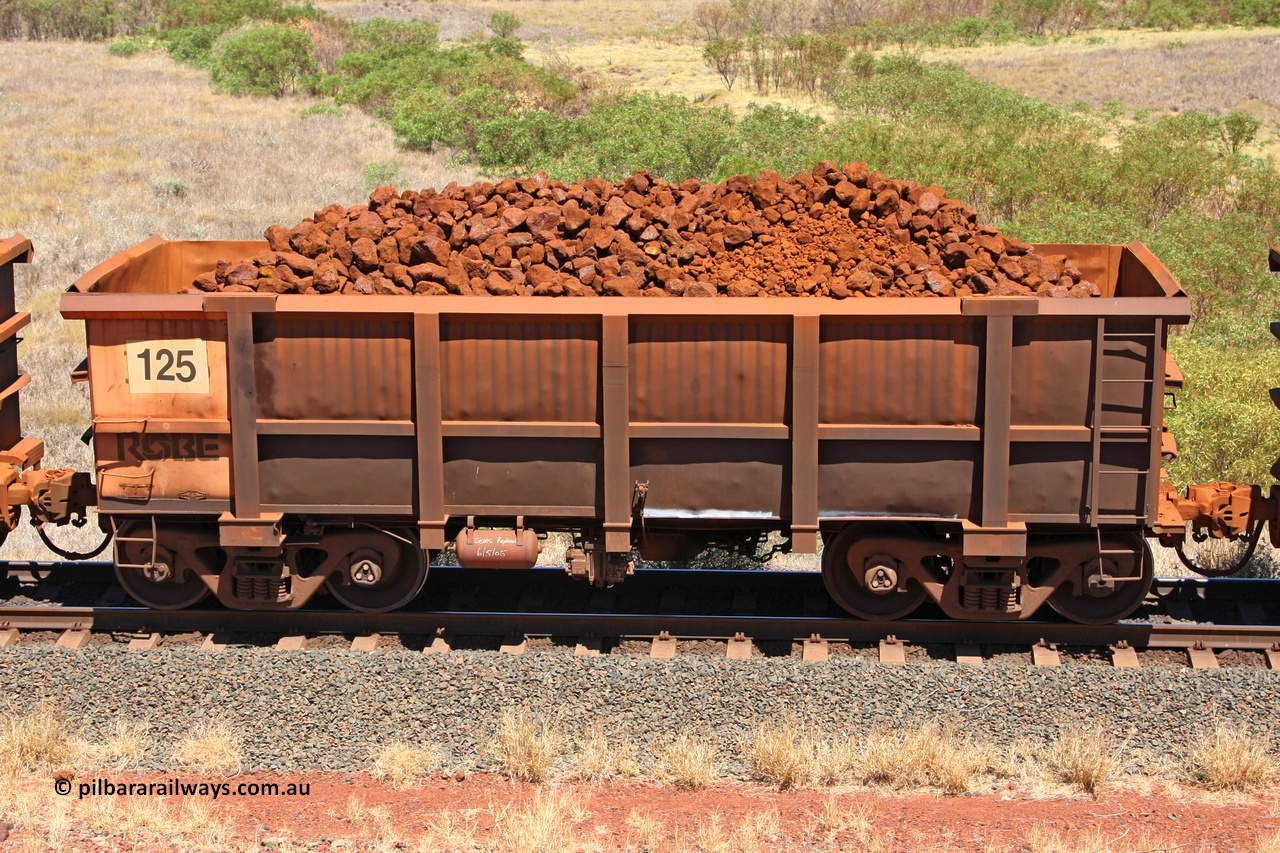 0125 081209 0121
Robe River ore waggon 125, built by Nippon Sharyo Nihon, non-handbrake side loaded view at the 7 km location just south of Cape Lambert yard. December 9, 2008.
Keywords: 125;Nippon-Sharyo-Nihon;Robe-ore-waggon;